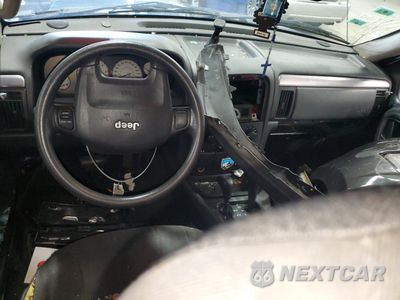 Zdjęcie 8 z 15 samochodu: 2002 JEEP GRAND CHEROKEE LAREDO VIN:1J4GW48N42C210116 - miniatura