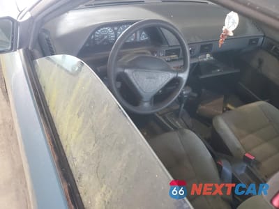 Zdjęcie 8 z 11 samochodu: 1994 MAZDA PROTEGE DX VIN:JM1BG2248R0778768 - miniatura