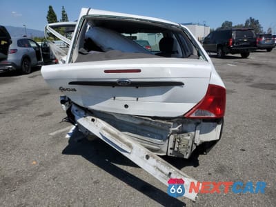 Zdjęcie 6 z 14 samochodu: 2001 FORD FOCUS LX VIN:1FAFP33PX1W294849 - miniatura