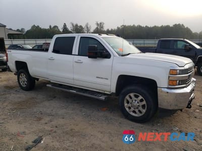 Czwarte zdjęcie samochodu z boku: 2015 CHEV SILVERADO VIN:1GC4KZCG3FF655767 - miniatura