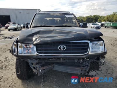 Piąte zdjęcie samochodu w środku: 2000 TOYOTA LAND CRUISER VIN:JT3HT05J2Y0124735 - miniatura