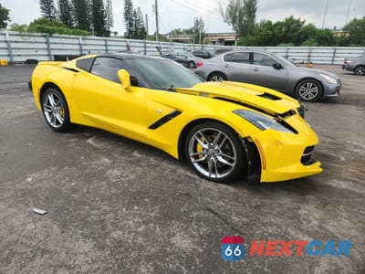 Czwarte zdjęcie samochodu z boku: 2014 CHEVROLET CORVETTE STINGRAY Z51 3LT VIN:1G1YM2D7XE5101804 - miniatura