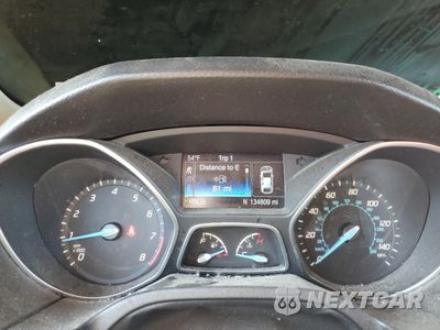 Zdjęcie 9 z 12 samochodu: 2014 FORD FOCUS TITANIUM VIN:1FADP3J2XEL316175 - miniatura