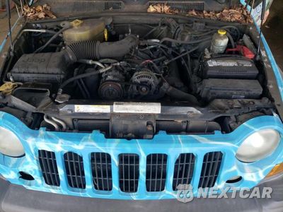 Zdjęcie 12 z 14 samochodu: 2007 JEEP LIBERTY SPORT VIN:1J4GL48K47W575240 - miniatura