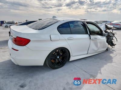 Trzecie zdjęcie samochodu z tyłu: 2013 BMW M5 VIN:WBSFV9C5XDD095469 - miniatura
