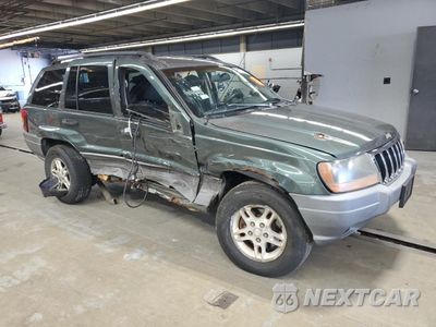 Czwarte zdjęcie samochodu z boku: 2002 JEEP GRAND CHEROKEE LAREDO VIN:1J4GW48N42C210116 - miniatura