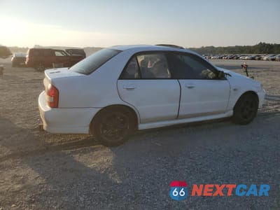 Trzecie zdjęcie samochodu z tyłu: 2003 MAZDA PROTEGE DX VIN:JM1BJ225630129987 - miniatura