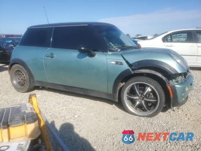 Czwarte zdjęcie samochodu z boku: 2002 MINI COOPER VIN:WMWRC33442TE12938 - miniatura