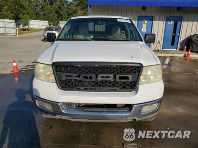 Piąte zdjęcie samochodu w środku: 2004 FORD F150 VIN:1FTPX12584NA81766 - miniatura