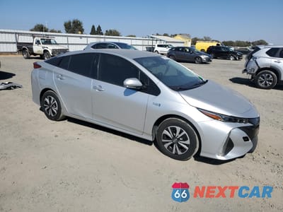 Czwarte zdjęcie samochodu z boku: 2018 TOYOTA PRIUS PRIME VIN:JTDKARFP7J3094943 - miniatura