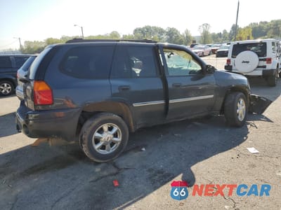 Trzecie zdjęcie samochodu z tyłu: 2007 GMC ENVOY VIN:1GKDT13S272238897 - miniatura