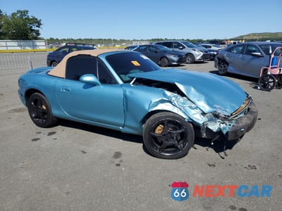 Czwarte zdjęcie samochodu z boku: 2001 MAZDA MX-5 MIATA BASE VIN:JM1NB353810217673 - miniatura