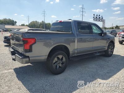 Trzecie zdjęcie samochodu z tyłu: 2024 FORD F150 LIGHTNING XLT VIN:1FT6W3L72RWG01682 - miniatura