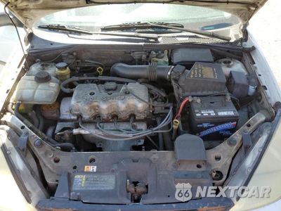 Zdjęcie 11 z 12 samochodu: 2001 FORD FOCUS LX VIN:1FAFP33PX1W294849 - miniatura