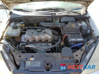 Zdjęcie 11 z 14 samochodu: 2001 FORD FOCUS LX VIN:1FAFP33PX1W294849 - miniatura