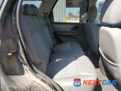 Zdjęcie 11 z 13 samochodu: 2006 FORD ESCAPE XLT VIN:1FMYU03106KA79108 - miniatura