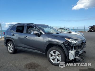 Czwarte zdjęcie samochodu z boku: 2019 TOYOTA RAV4 XLE VIN:JTMW1RFVXKD020427 - miniatura