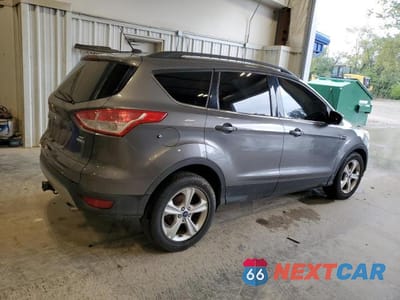 Trzecie zdjęcie samochodu z tyłu: 2014 FORD ESCAPE SE VIN:1FMCU9G98EUA95672 - miniatura