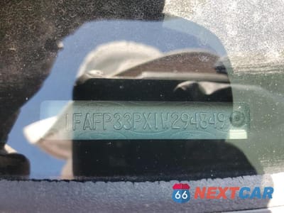 Zdjęcie 12 z 12 samochodu: 2001 FORD FOCUS LX VIN:1FAFP33PX1W294849 - miniatura