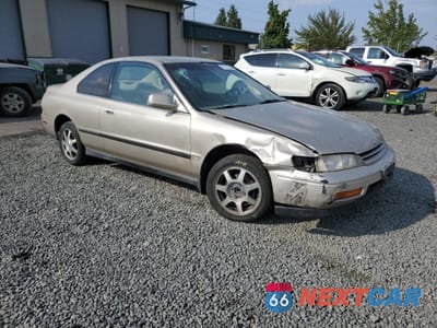 Czwarte zdjęcie samochodu z boku: 1994 HONDA ACCORD LX VIN:1HGCD7149RA007842 - miniatura