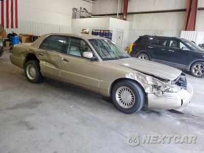 Czwarte zdjęcie samochodu z boku: 2000 MERCURY GRAND MARQUIS LS VIN:2MEFM75W3YX725673 - miniatura