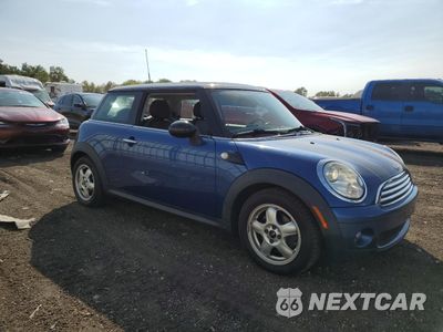 Czwarte zdjęcie samochodu z boku: 2009 MINI COOPER VIN:WMWMF33509TU70580 - miniatura