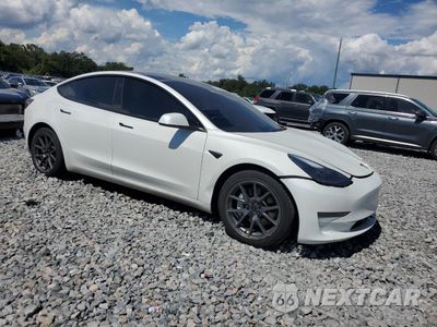 Czwarte zdjęcie samochodu z boku: 2023 TESLA MODEL 3 VIN:5YJ3E1EA9PF540738 - miniatura