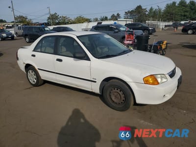 Czwarte zdjęcie samochodu z boku: 2000 MAZDA PROTEGE DX VIN:JM1BJ222XY0308482 - miniatura