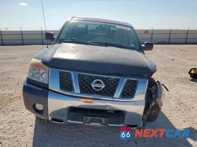 Piąte zdjęcie samochodu w środku: 2010 NISSAN TITAN XE VIN:1N6BA0ED6AN311709 - miniatura
