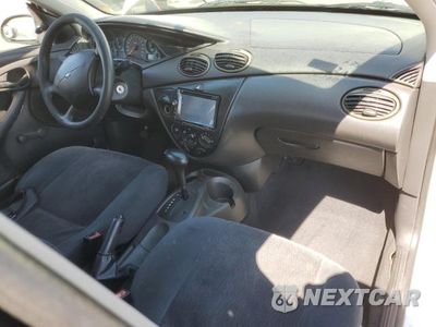 Zdjęcie 8 z 12 samochodu: 2001 FORD FOCUS LX VIN:1FAFP33PX1W294849 - miniatura