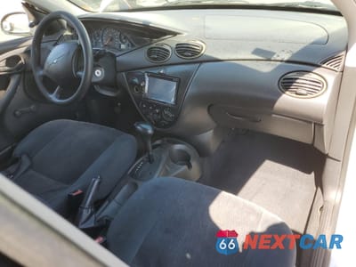 Zdjęcie 8 z 14 samochodu: 2001 FORD FOCUS LX VIN:1FAFP33PX1W294849 - miniatura