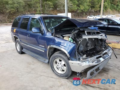 Czwarte zdjęcie samochodu z boku: 2001 CHEVROLET TAHOE C1500 VIN:1GNEC13T91R110977 - miniatura