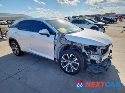 Czwarte zdjęcie samochodu z boku: 2019 LEXUS RX 350 BASE VIN:2T2ZZMCA5KC144110 - miniatura