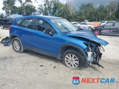 Czwarte zdjęcie samochodu z boku: 2014 MAZDA CX-5 SPORT VIN:JM3KE2BE9E0302206 - miniatura