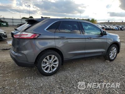 Trzecie zdjęcie samochodu z tyłu: 2024 FORD EDGE TITANIUM VIN:2FMPK4K94RBB20385 - miniatura