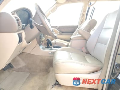 Zdjęcie 7 z 14 samochodu: 2000 TOYOTA LAND CRUISER VIN:JT3HT05J2Y0124735 - miniatura
