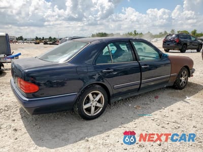 Trzecie zdjęcie samochodu z tyłu: 1997 MERCEDES-BENZ E 420 VIN:WDBJF72F0VA348667 - miniatura