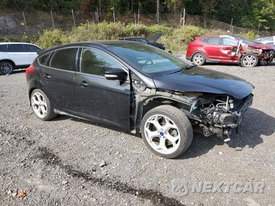 Czwarte zdjęcie samochodu z boku: 2014 FORD FOCUS ST VIN:1FADP3L99EL315710 - miniatura
