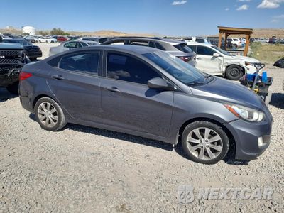 Czwarte zdjęcie samochodu z boku: 2012 HYUNDAI ACCENT GLS VIN:KMHCU4AE5CU181155 - miniatura