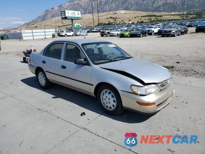 Czwarte zdjęcie samochodu z boku: 1996 TOYOTA COROLLA BASE VIN:2T1BA02E9TC155123 - miniatura
