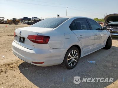 Trzecie zdjęcie samochodu z tyłu: 2017 VOLKSWAGEN JETTA SE VIN:3VWDB7AJ4HM285724 - miniatura