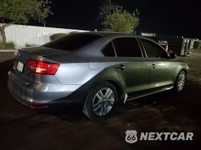 Trzecie zdjęcie samochodu z tyłu: 2015 VOLKSWAGEN JETTA BASE VIN:3VW2K7AJ1FM243225 - miniatura