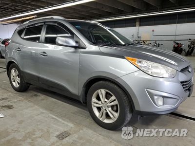 Czwarte zdjęcie samochodu z boku: 2011 HYUNDAI TUCSON GLS VIN:KM8JU3AC5BU174947 - miniatura