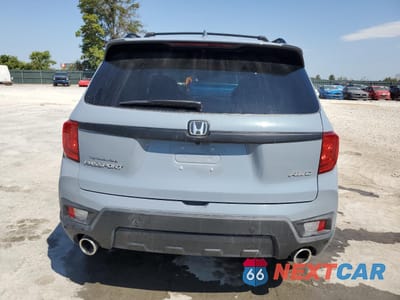 Zdjęcie 6 z 16 samochodu: 2023 HONDA PASSPORT EXL VIN:5FNYF8H56PB021768 - miniatura