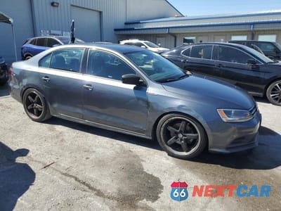 Czwarte zdjęcie samochodu z boku: 2016 VOLKSWAGEN JETTA S VIN:3VW167AJ0GM382909 - miniatura