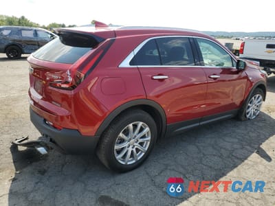 Trzecie zdjęcie samochodu z tyłu: 2022 CADILLAC XT4 LUXURY VIN:1GYFZBR40NF146060 - miniatura