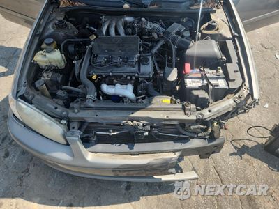 Zdjęcie 11 z 12 samochodu: 2000 TOYOTA CAMRY LE VIN:4T1BF28K1YU094592 - miniatura