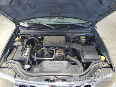 Zdjęcie 12 z 15 samochodu: 2002 JEEP GRAND CHEROKEE LAREDO VIN:1J4GW48N42C210116 - miniatura