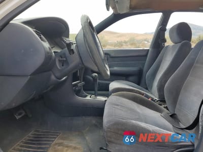 Zdjęcie 7 z 14 samochodu: 1994 TOYOTA COROLLA LE VIN:1NXAE09B7RZ196711 - miniatura