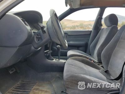 Zdjęcie 7 z 14 samochodu: 1994 TOYOTA COROLLA LE VIN:1NXAE09B7RZ196711 - miniatura